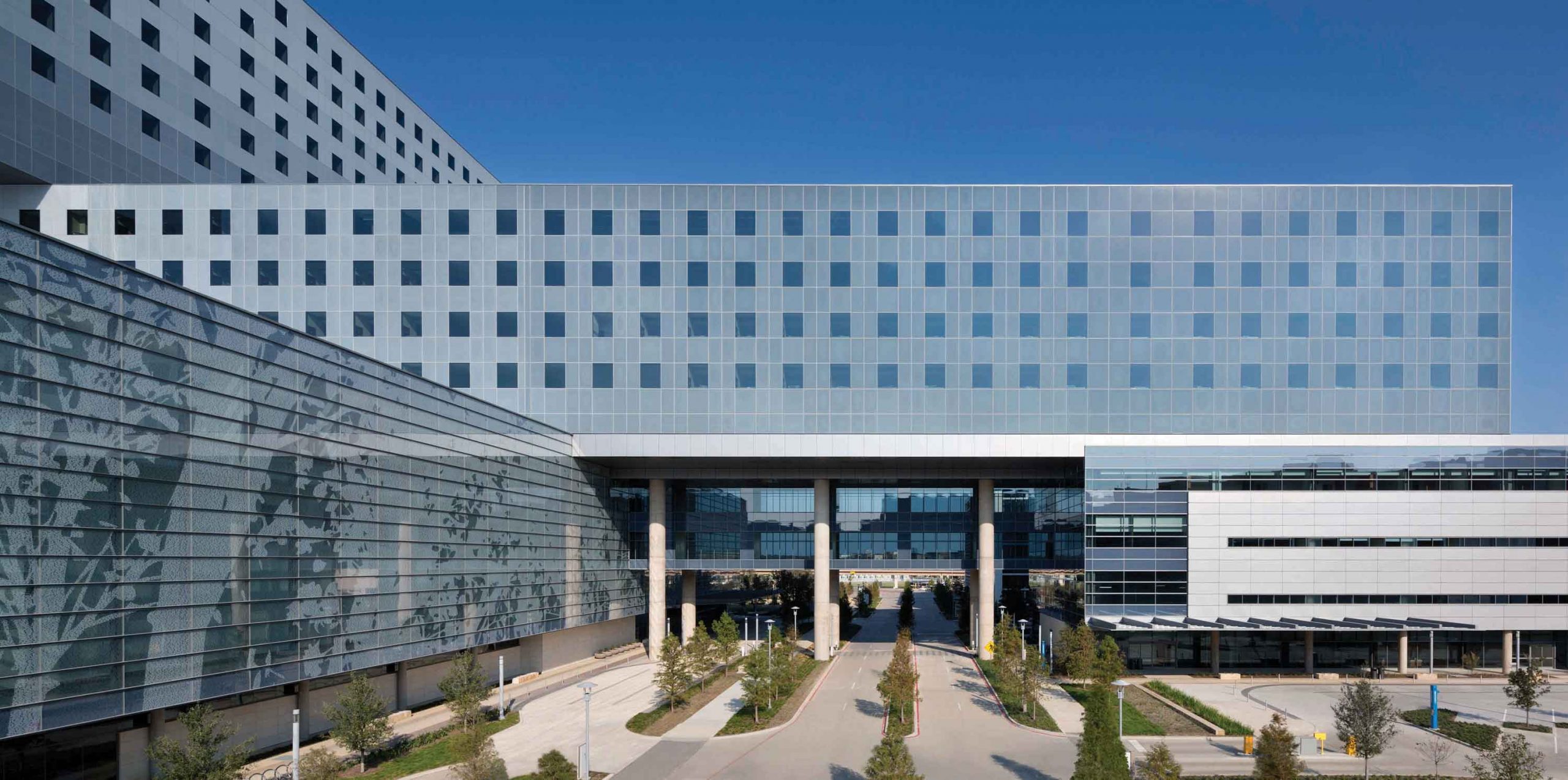 Trees on Main Glass Facade Visitors to Parkland Hospital